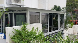 Enclosed Balcony with Aluminium Composite Panel and Sliding Window and Swing Door 2