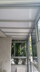 Enclosed Balcony with Sliding Window, Swing Door and Polycarbonate Shelter